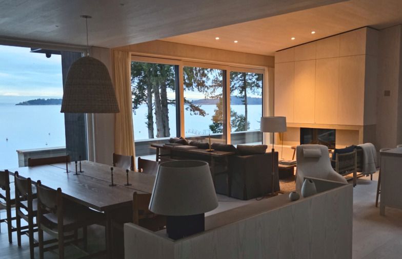 Cuckoo's Point primary dwelling. Kneer Südfenster aluminum-clad wood sliding door, open to the water.